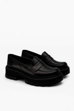 Black chunky loafers minimalist design back view