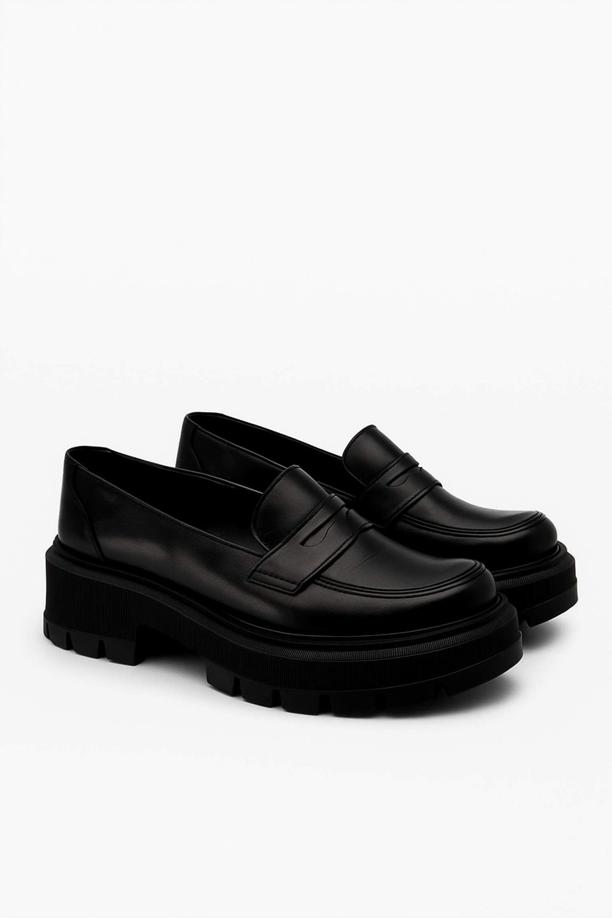 Black chunky loafers minimalist design back view